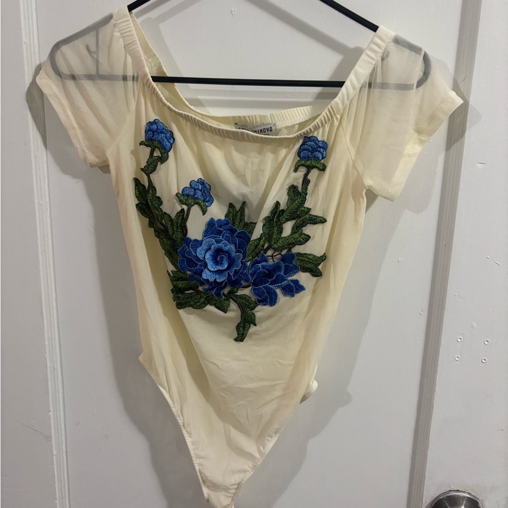 Fashion Nova Cream Bodysuit with Blue Floral Embroidery